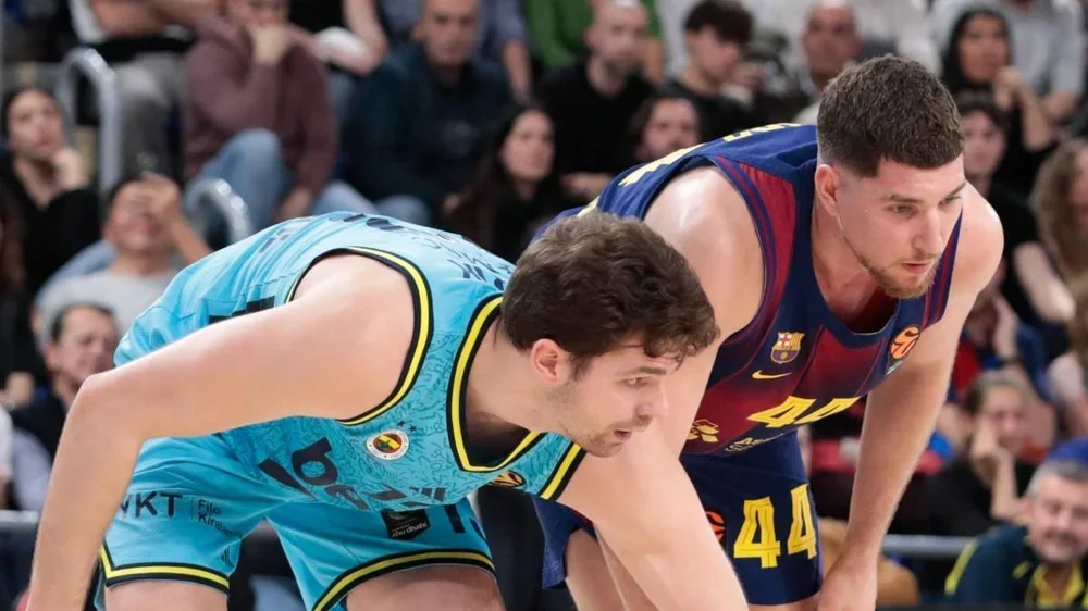 Tarik Biberovic, junto a Joel Parra